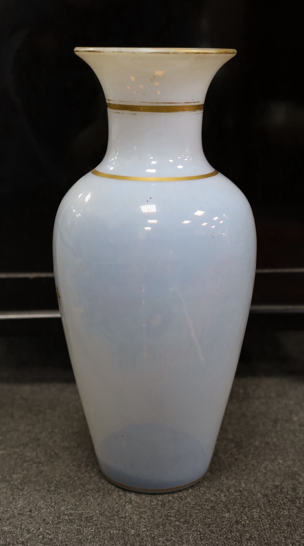 A 19th century French floral painted opaline glass baluster vase, possibly Baccarat, 43cms high